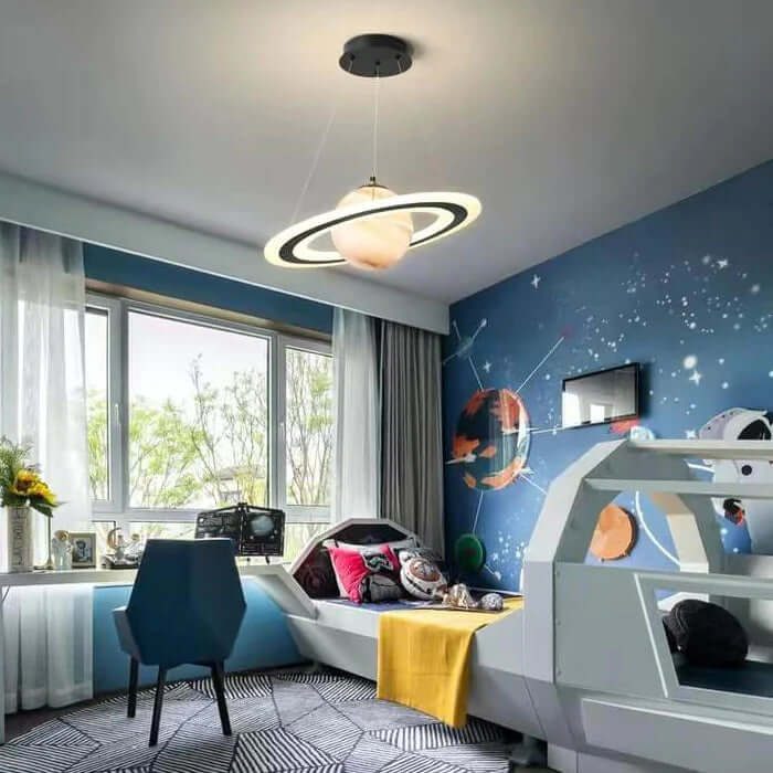 Whimsical LED planet pendant light, perfect for a magical children's bedroom. Durable & energy-efficient.