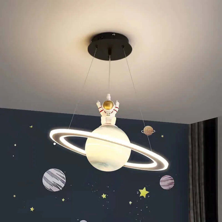 Imaginative LED planet pendant light, perfect for a child's space-themed room. Magical and energy-efficient.