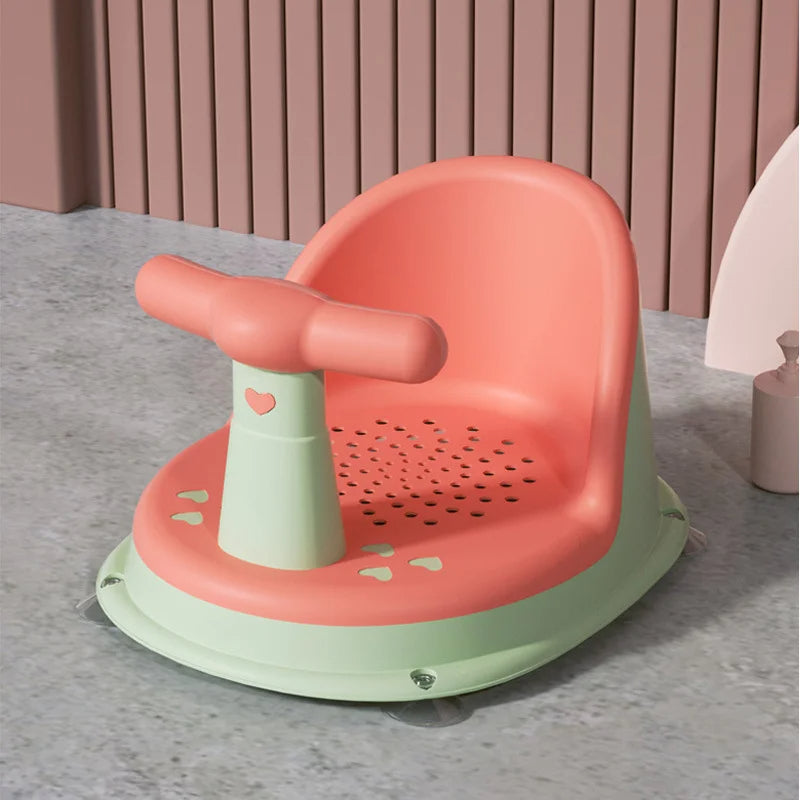 White plastic infant bath seat with backrest and non-slip suction for safe, comfortable toddler bathing support.