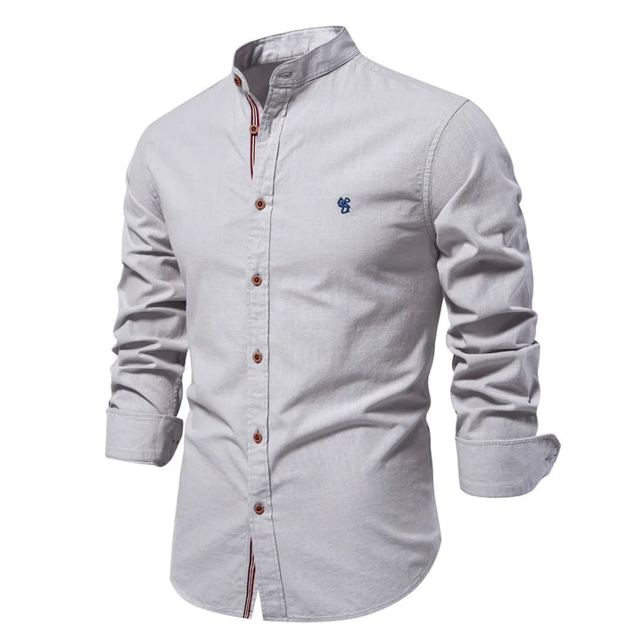Men's classic button-down shirt, a long sleeve casual top ideal for smart casual & office fashion.
