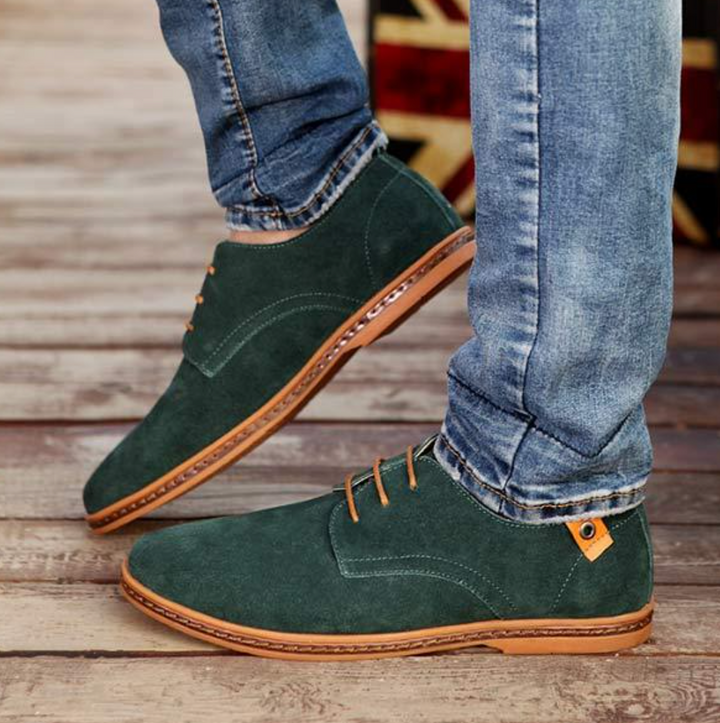 Front view of classic men's formal lace-up Oxford dress shoes with a sleek round toe design.