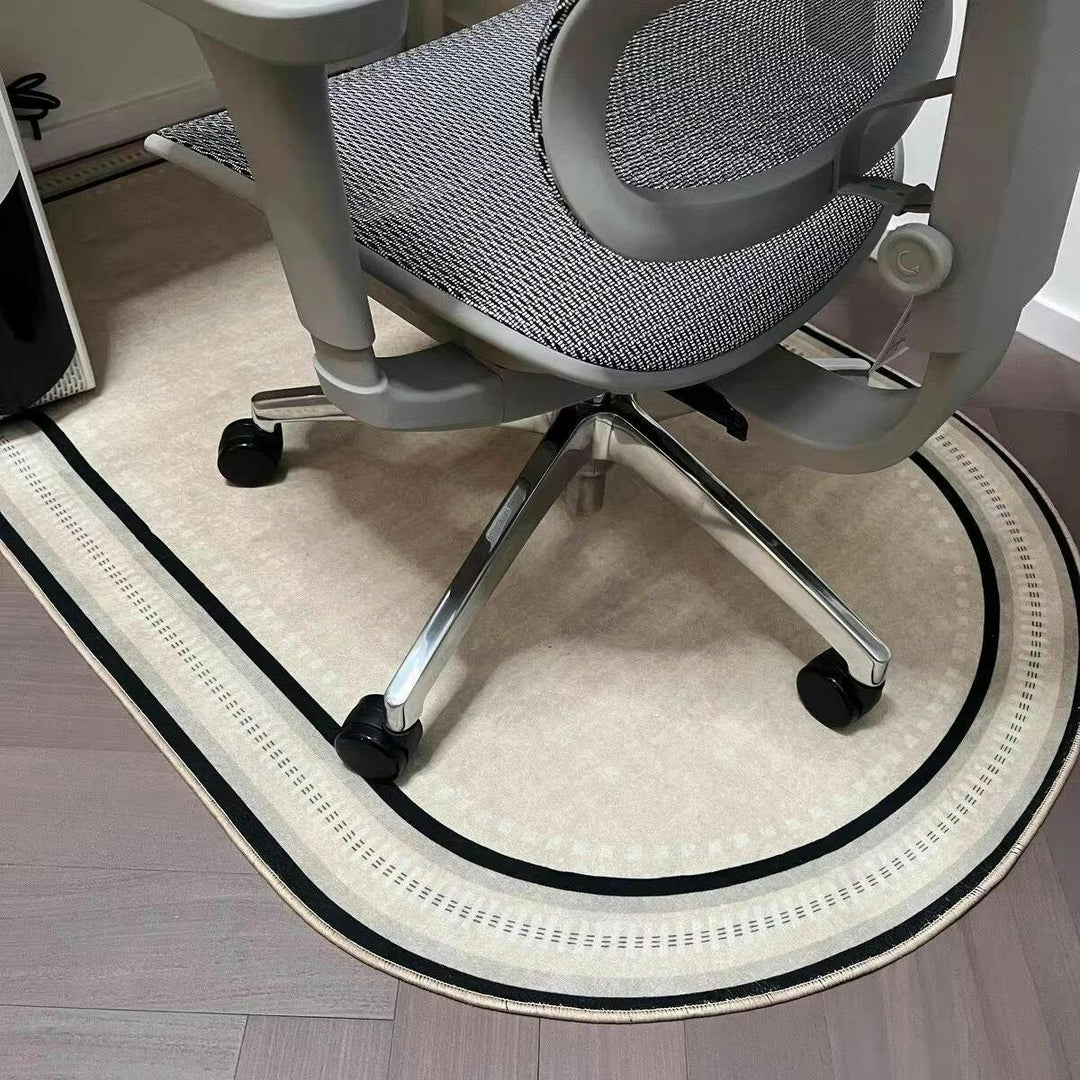 Clear office chair mat with non-slip backing protects hard floors & carpets from rolling chair damage in a home office.