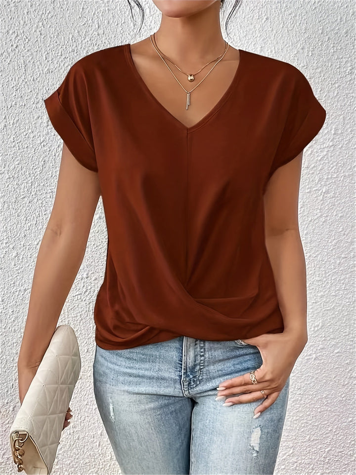 Everyday V-neck top for women, featuring a relaxed fit for ultimate comfort. Essential ladies casual wear.