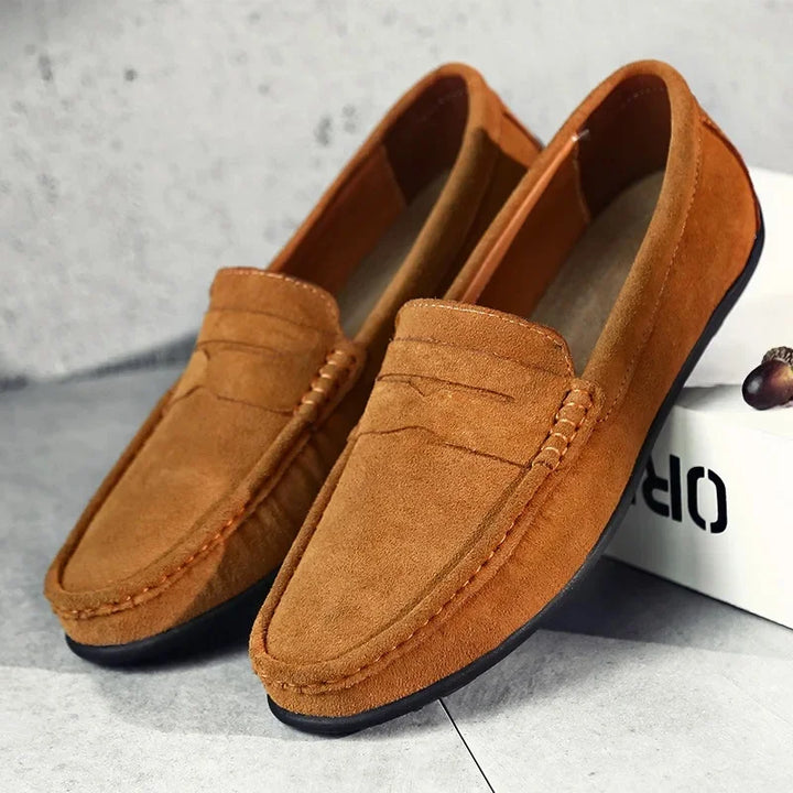 Men's classic slip-on penny loafers, a versatile choice for spring and summer smart casual and relaxed styles.