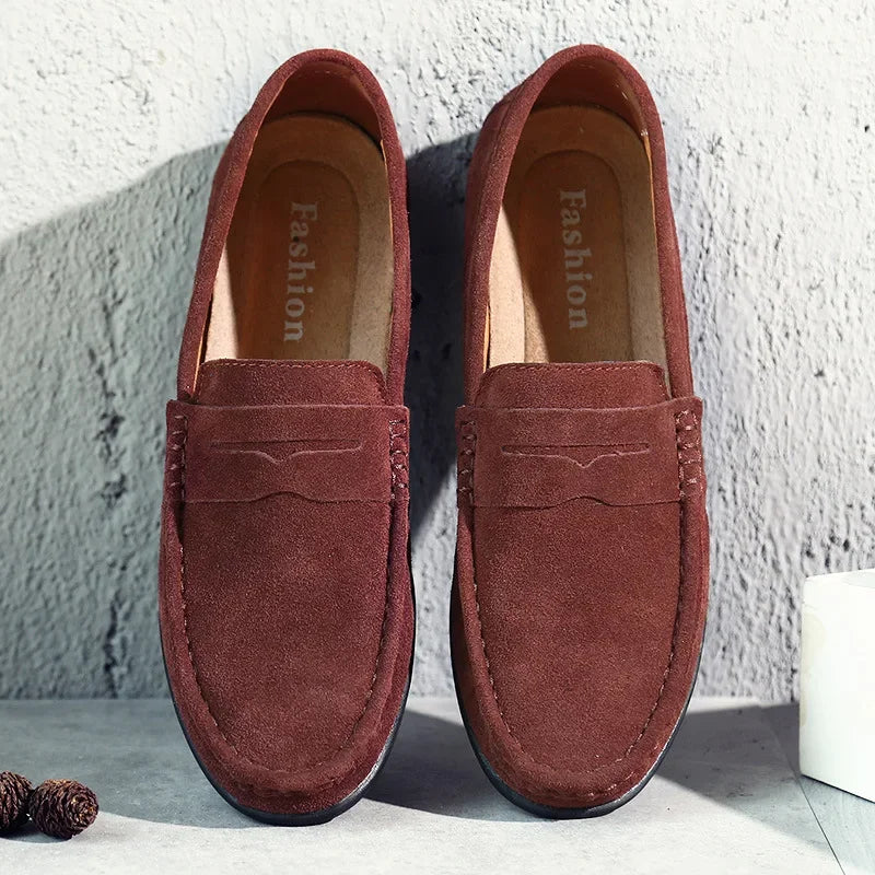Men's versatile brown leather penny loafers for comfortable everyday smart casual spring and summer style.