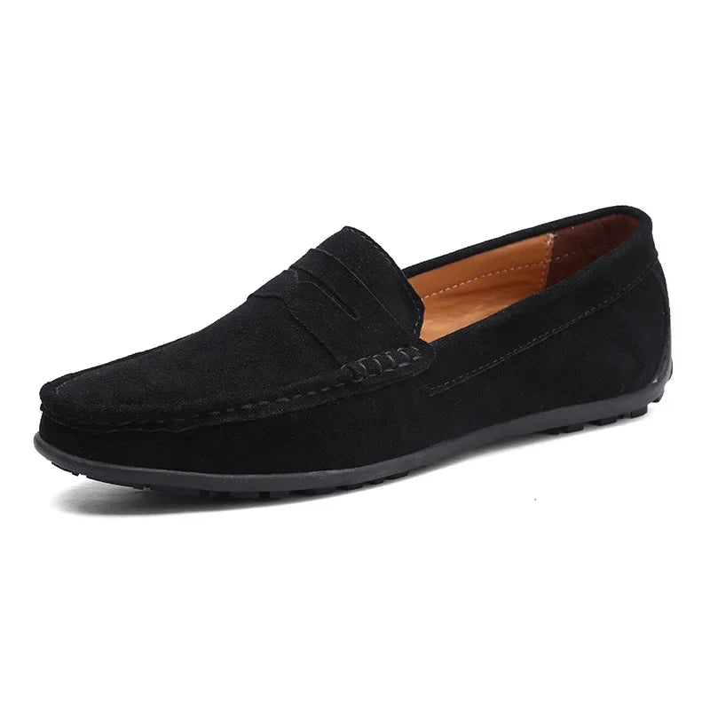 Side profile of men's classic tan penny loafers, essential slip-on casual footwear for spring and summer.