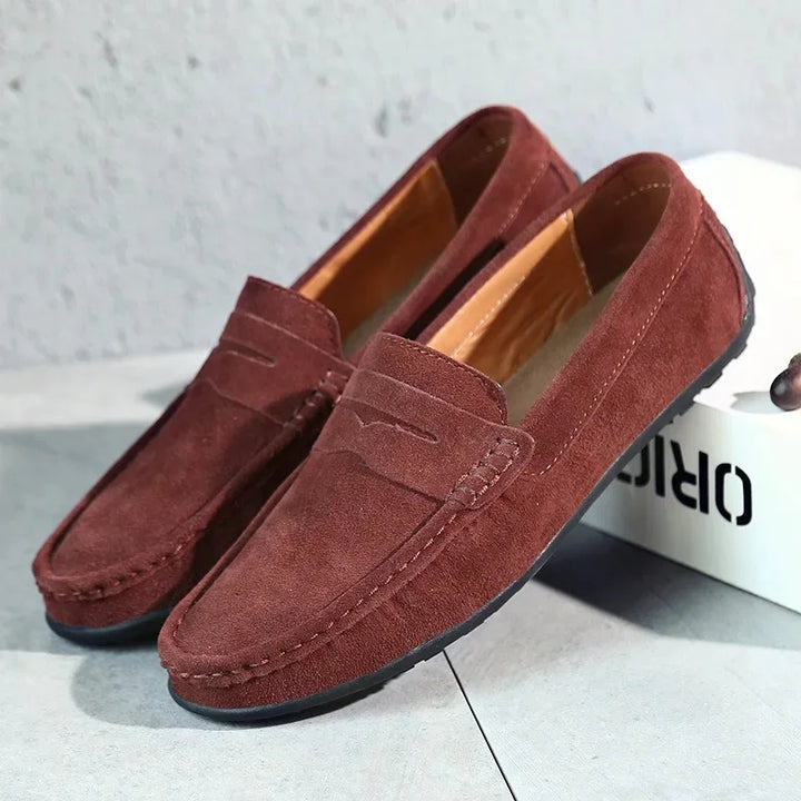 Men's fashion-forward slip-on penny loafers, combining classic style with spring and summer comfort.