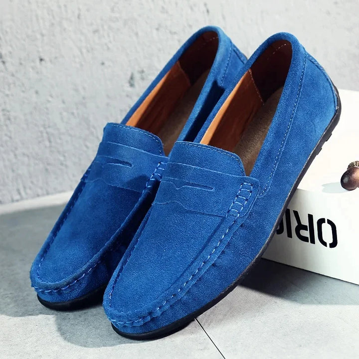Pair of men's dressy yet casual penny loafers, perfect slip-on shoes for spring and summer smart outfits.