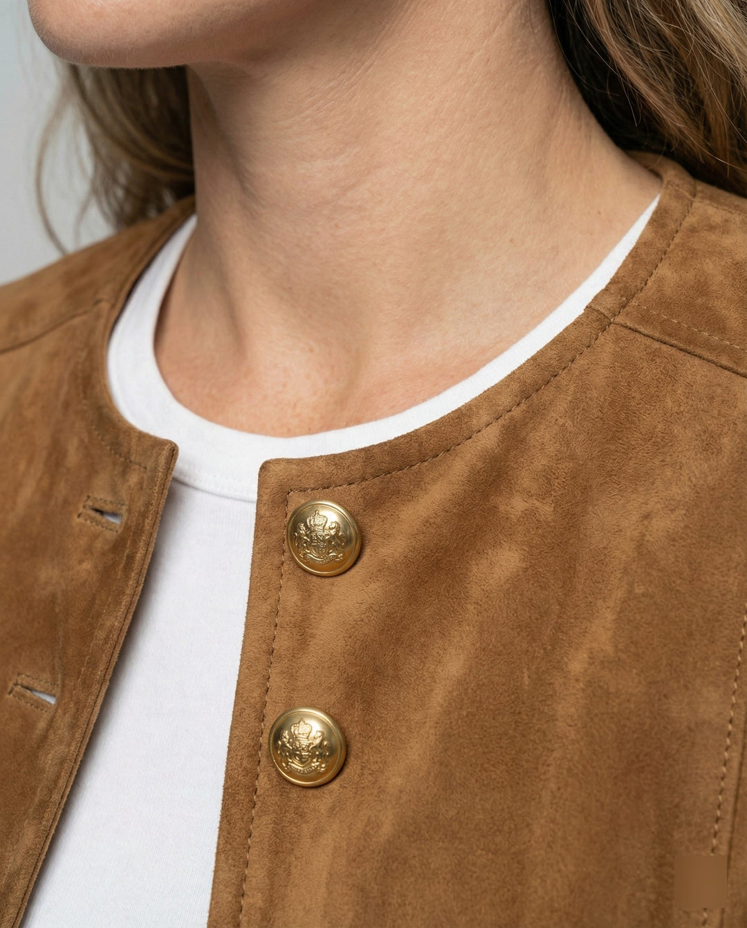 Stylish women's spring/fall jacket with ornate gold buttons, a timeless classic design for ladies.
