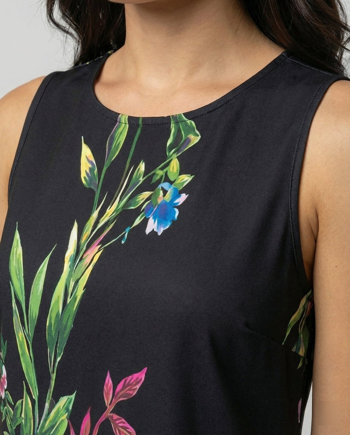 Flowy women's summer dress, sleeveless with a colorful artistic print for comfortable wear.