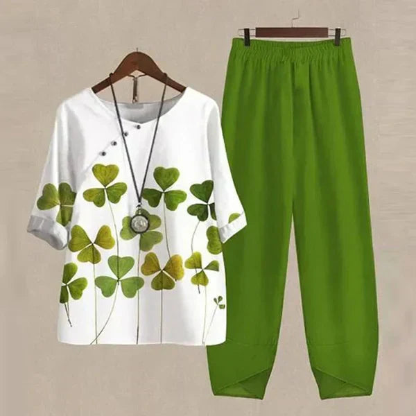 Chic women's relaxed fit shirt & trouser set. Stylish two-piece for comfortable summer fashion.