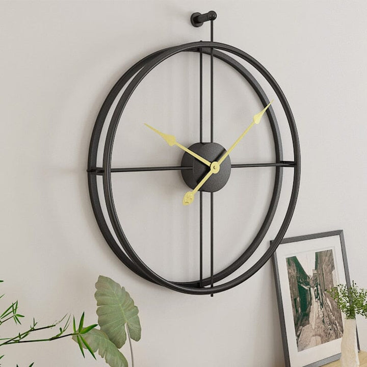 Sleek metal geometric wall clock, a large silent quartz timepiece for modern, luxury home decoration.