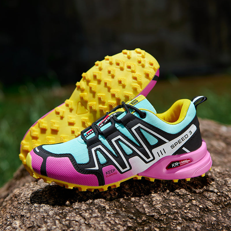 Athletic women's hiking footwear, offering lightweight comfort & slip resistance on trails.