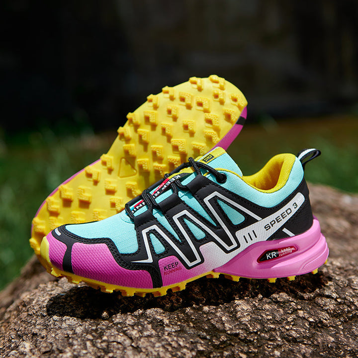 Athletic women's hiking footwear, offering lightweight comfort & slip resistance on trails.