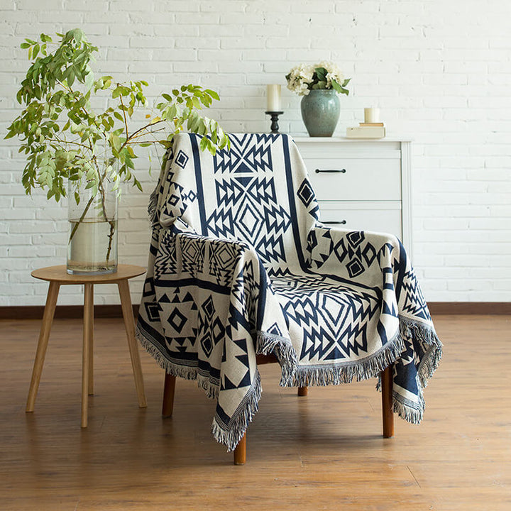 "Colorful bohemian tassel knitted sofa throw, featuring bright patterns and ethnic tassel details for vibrant home decor."