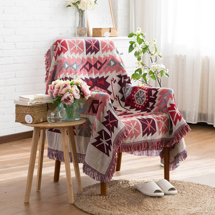 "Colorful bohemian tassel knitted sofa throw, featuring bright patterns and ethnic tassel details for vibrant home decor."