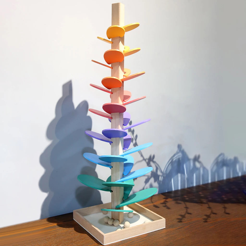 Natural wood rainbow sound tower for kids' sensory play. Ideal educational toy gift for babies & preschoolers.