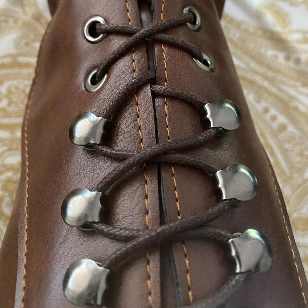 Women's ankle-length retro knight boots with high heels, combining medieval & punk styles.