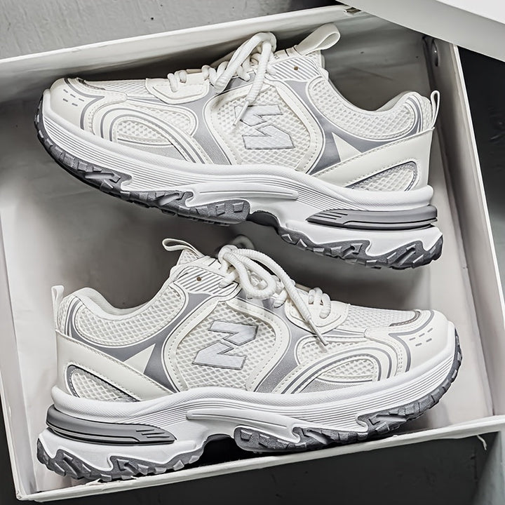 Versatile low-top lace-up sneakers for men and women. Comfortable trainers for casual walking and outdoor use.