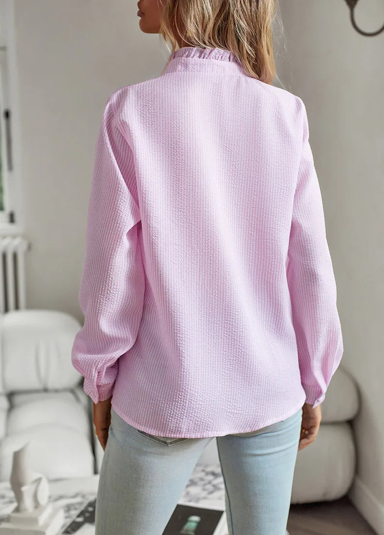 Stylish women's classic blouse, perfect for professional office wear and elegant everyday looks.