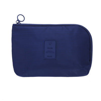 On-the-go compact electronics organizer. Waterproof pouch for essential cable management & tech storage.