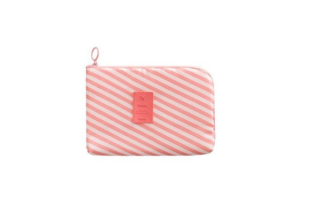 Compact waterproof electronics travel organizer & free mini storage case for cable management.