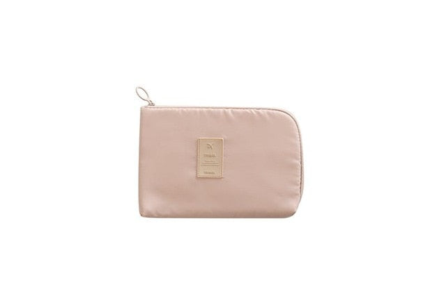 Waterproof travel organizer for electronics. Safely store cables, chargers & gadgets in one compact pouch.