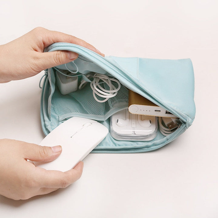 Keep travel electronics tidy with this compact waterproof nylon organizer. Perfect for tech gadgets.