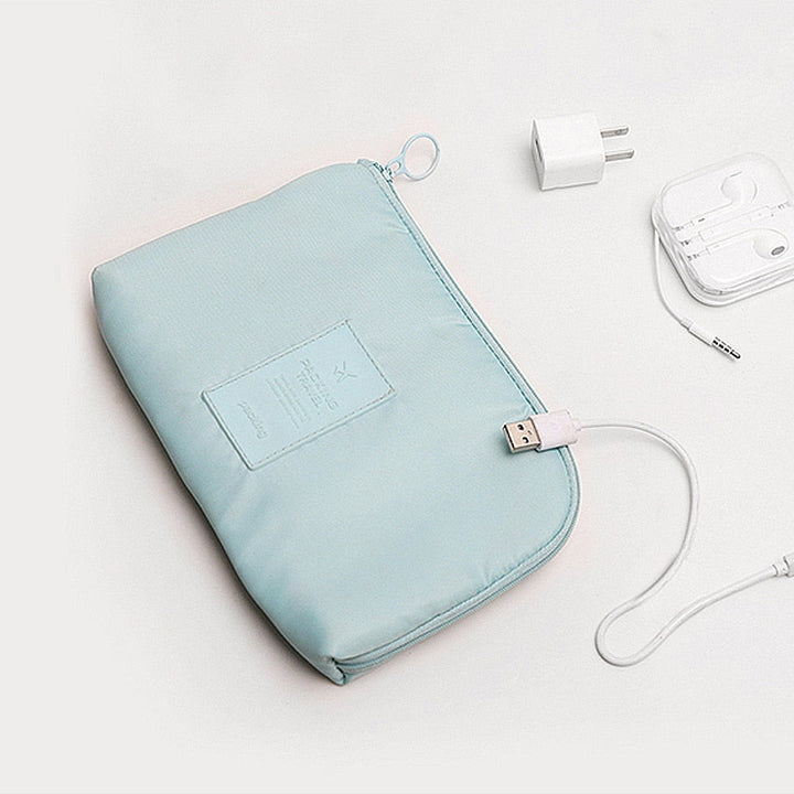 Unisex waterproof nylon electronics organizer. Compact design for travel cable management & gadget storage.