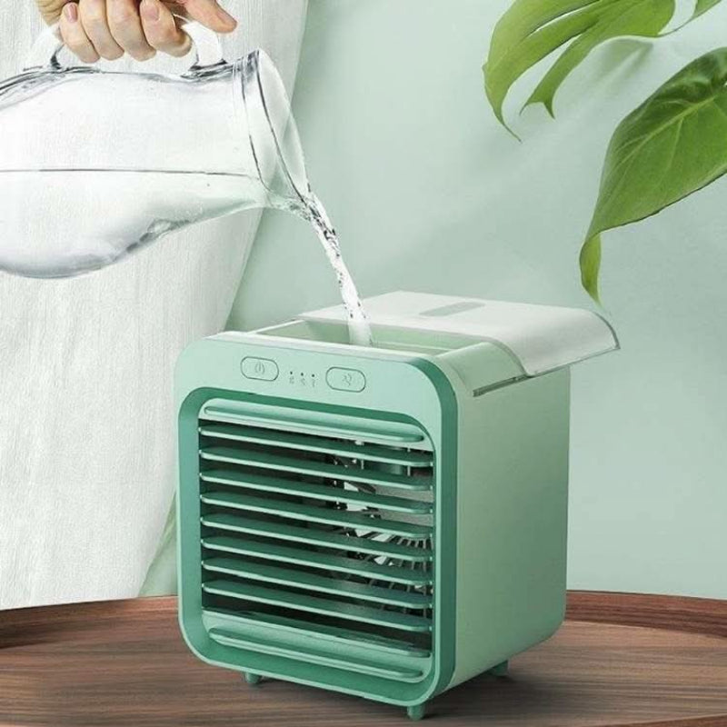 Evaporative personal air cooler, a compact 3-speed desk fan for office, bedroom, or tabletop cooling.