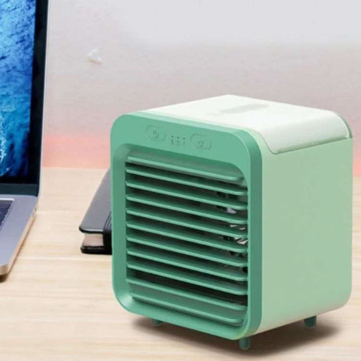 Small personal portable air cooler with 3-speed fan & LED light, perfect for desks, offices & bedrooms.