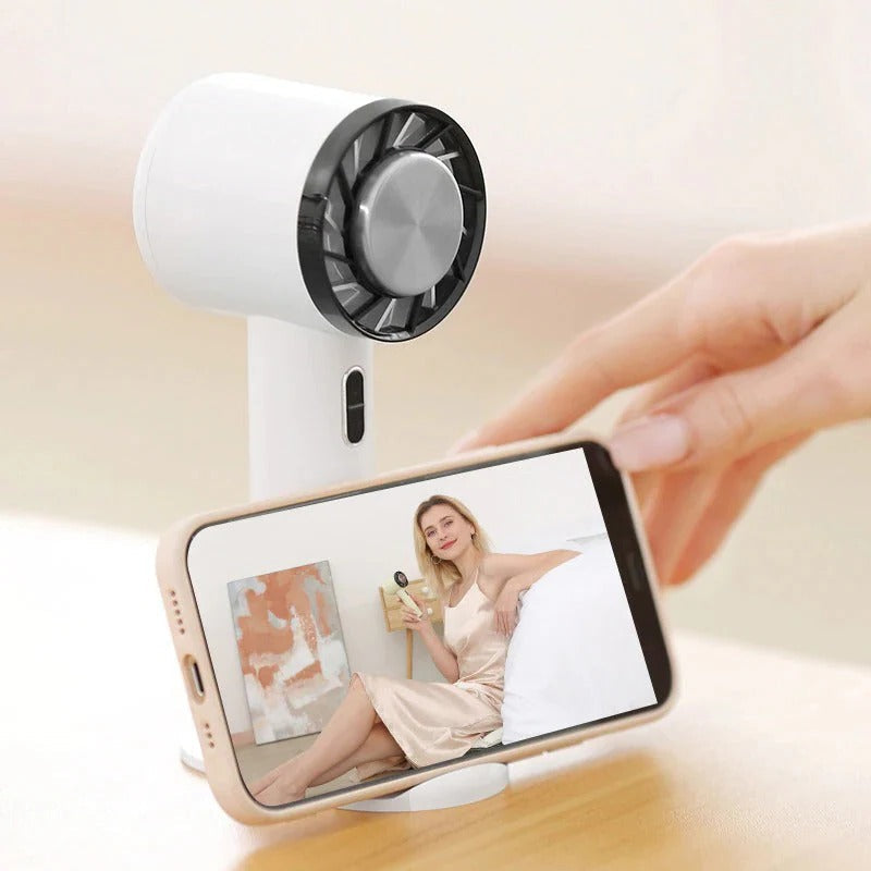 Outdoor portable fan, rechargeable mini air circulator for camping, travel, and personal cooling on the go.