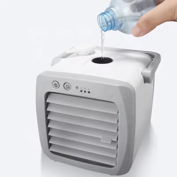 Sleek, portable USB desk fan for personal cooling. Features humidifier for enhanced indoor air comfort.