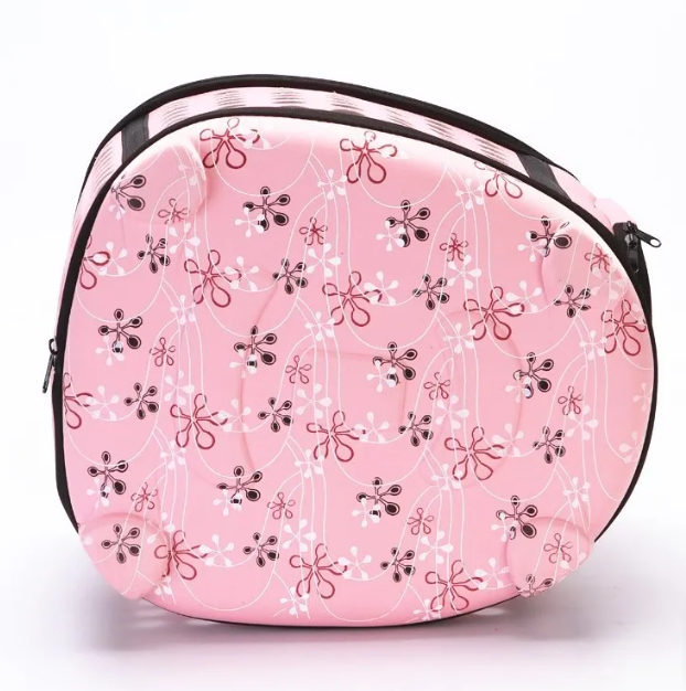 Modern, compact cat carrier with excellent ventilation for comfortable pet transport. Ideal pet travel bag.