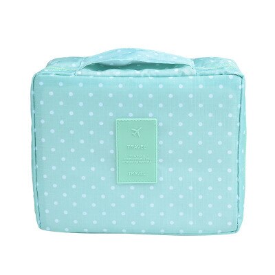 Compact waterproof makeup travel organizer for women, dark blue floral print, perfect for toiletries.