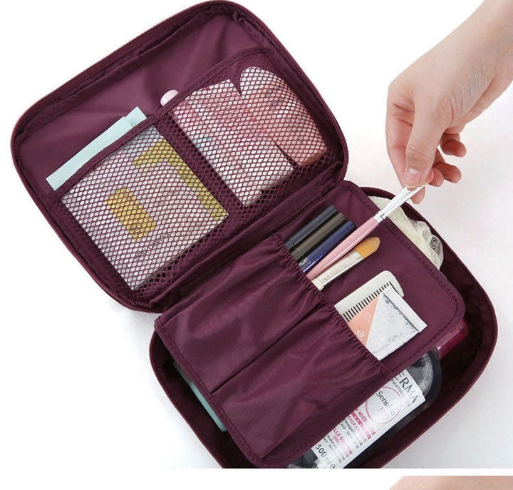Compact waterproof cosmetic travel case for women, dark blue floral, perfect for secure makeup storage.