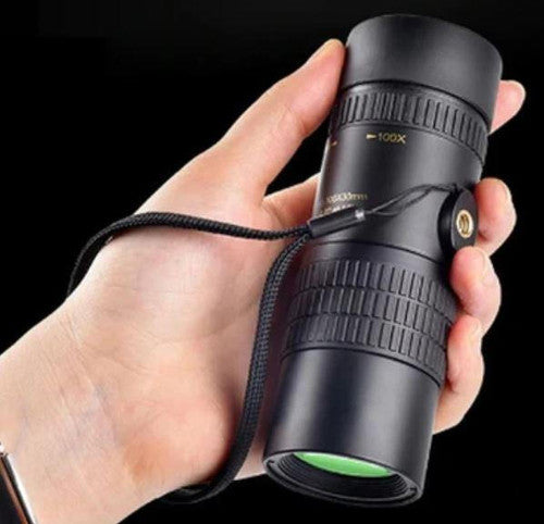 Compact waterproof monocular telescope with 10x zoom, night vision, and smartphone compatibility for outdoor adventures.