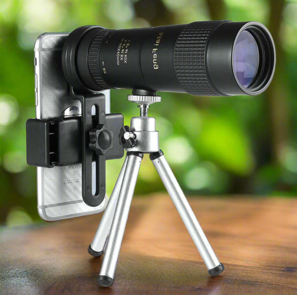 Compact waterproof monocular telescope with 10x zoom, night vision, and smartphone compatibility for outdoor adventures.