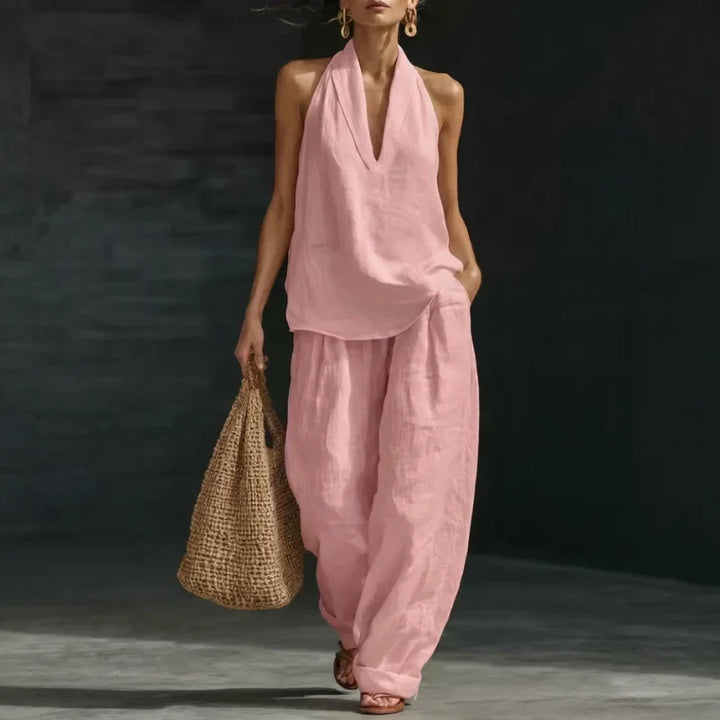 Women's comfortable linen-look two-piece outfit. Wide-leg pants & batwing top for chic summer casual wear.