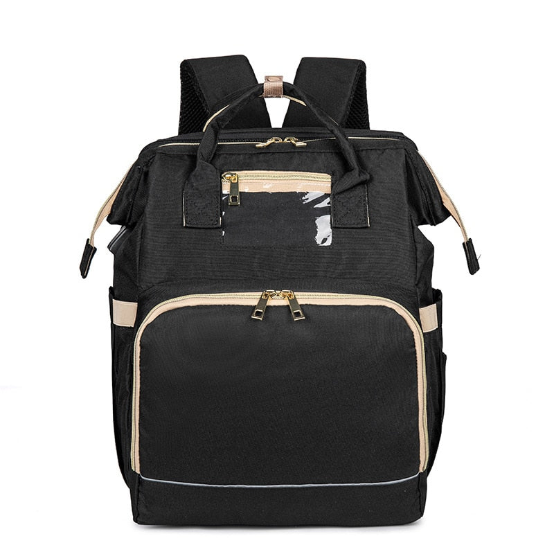Waterproof convertible baby bag with foldable bassinet. Multi-pocket diaper backpack, perfect for naps on the go.