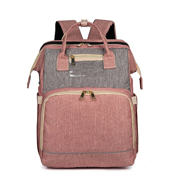 Multi-pocket convertible nappy backpack with integrated foldable bassinet. Keeps baby essentials organized & accessible.