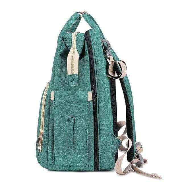 Convertible nappy backpack & portable bassinet. Easily attaches to strollers for convenient travel with baby essentials.