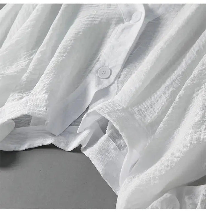 Elegant & casual women's batwing sleeve blouse, made from breathable cotton linen, featuring a comfortable relaxed fit.