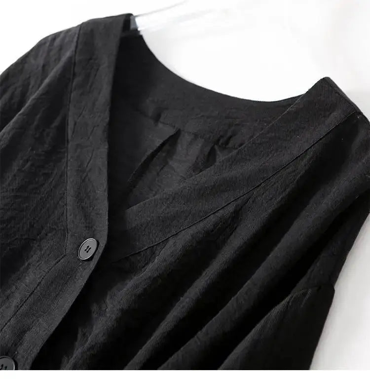 Flowy cotton linen women's blouse with relaxed batwing sleeves and tasteful button details, ideal for versatile fashion.