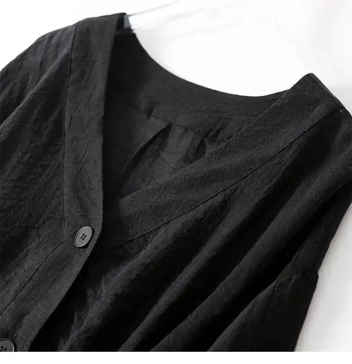 Flowy cotton linen women's blouse with relaxed batwing sleeves and tasteful button details, ideal for versatile fashion.