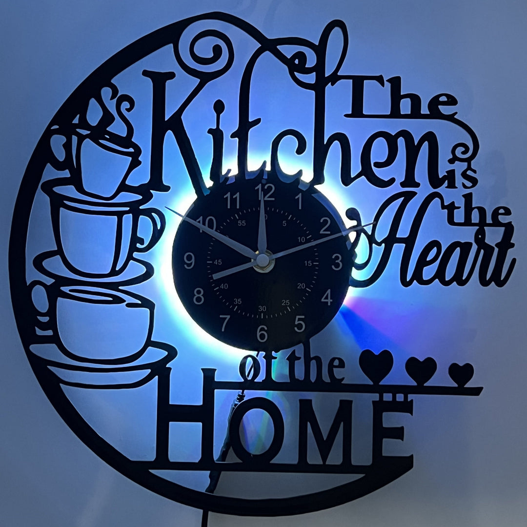 Modern LED decorative kitchen wall clock for home decor. Creates a warm, cozy atmosphere in any kitchen space.
