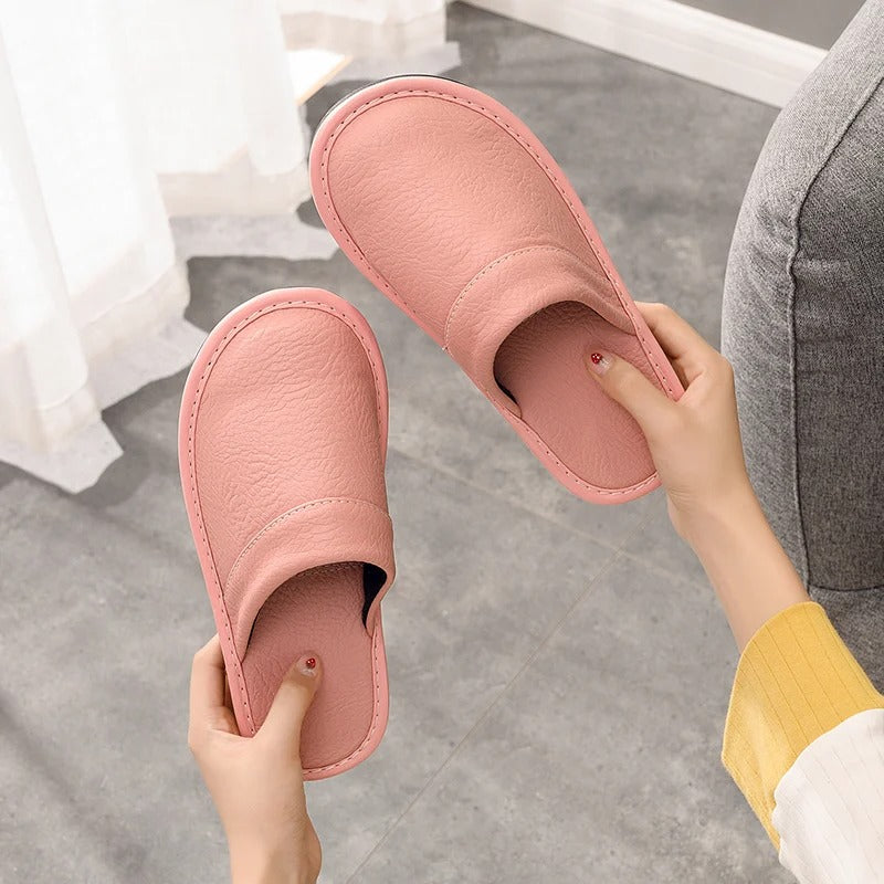 Premium women's slippers, offering soft foot comfort for relaxed home wear. Elegant indoor shoes.