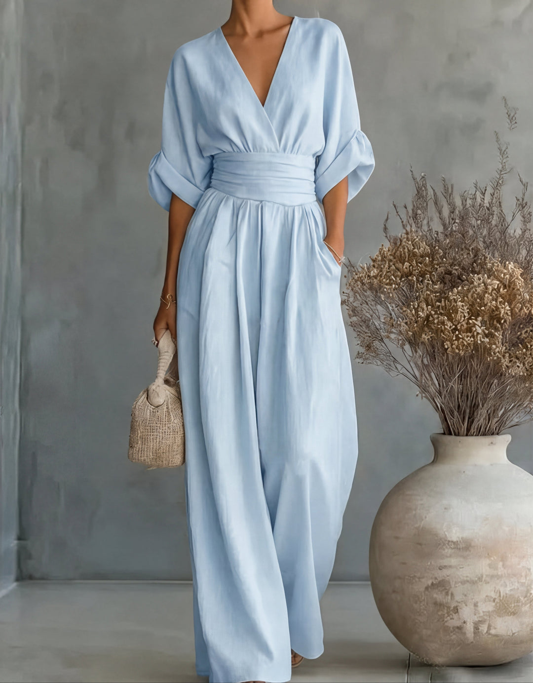 Fashionable women's wide-leg jumpsuit, a stylish one-piece for effortless spring elegance.