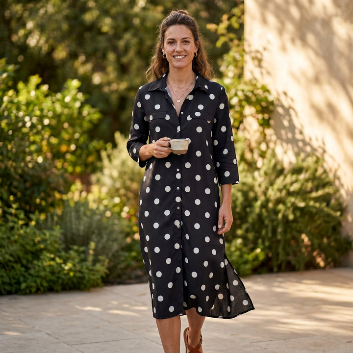 Stylish women's long sleeve polka dot shirt dress in a flowing maxi length, perfect for any occasion.