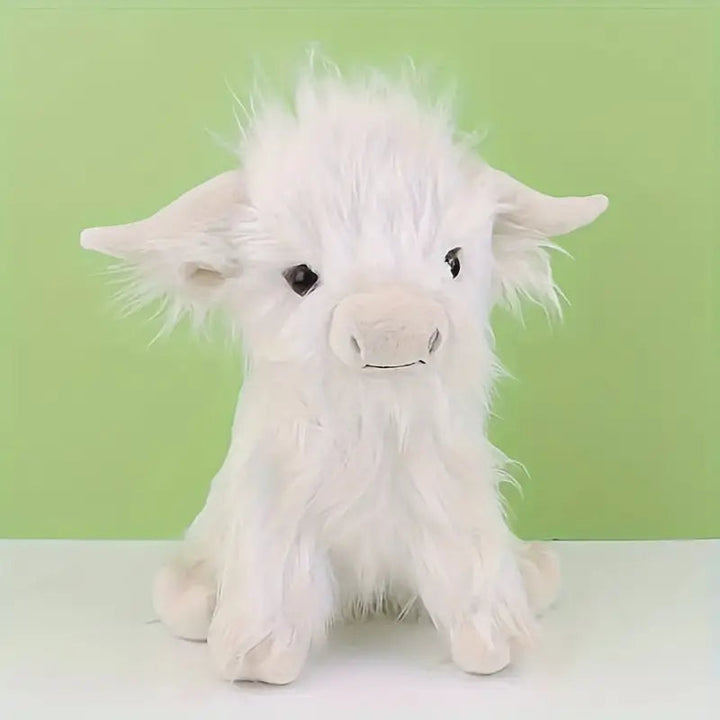 Adorable shaggy Highland Cow plush, a super soft cuddly toy and comfort gift for all ages.